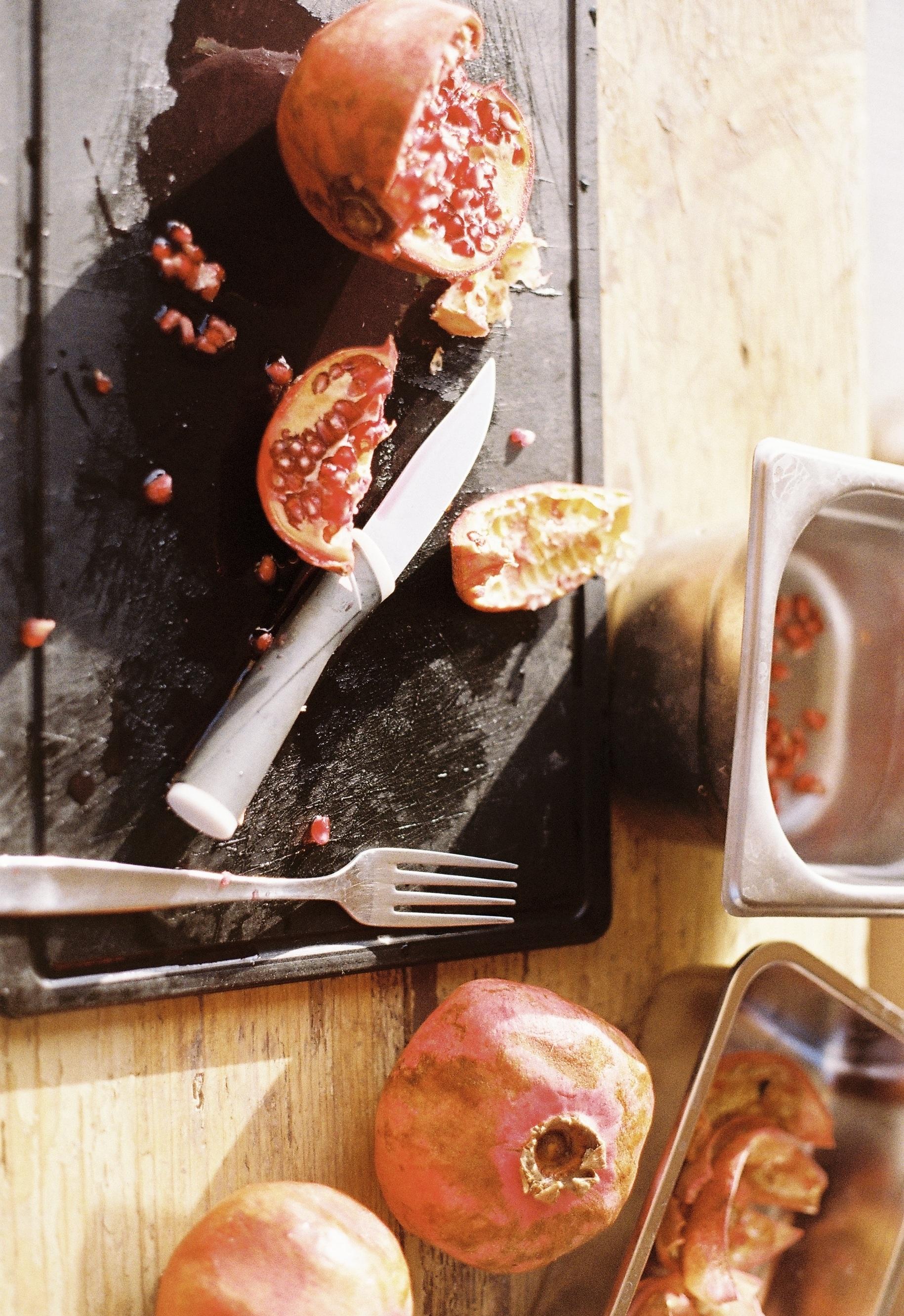 Fresh pomegranates being prepared at the Casa YUVI table